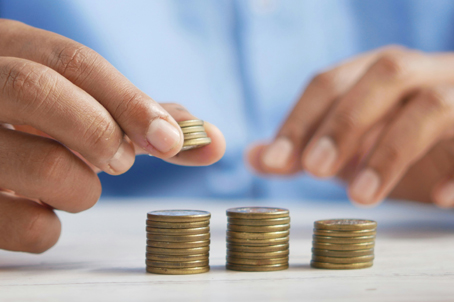 Image of piles of money representing Pensions